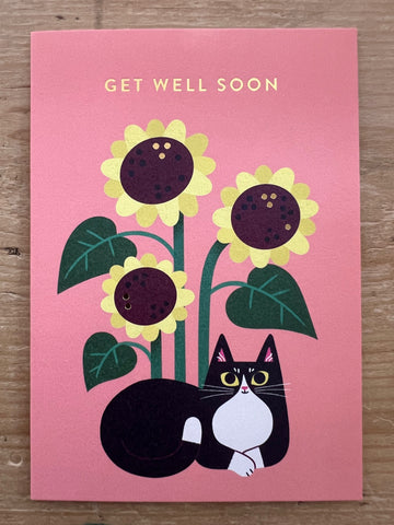 Cat Among the Sunflowers